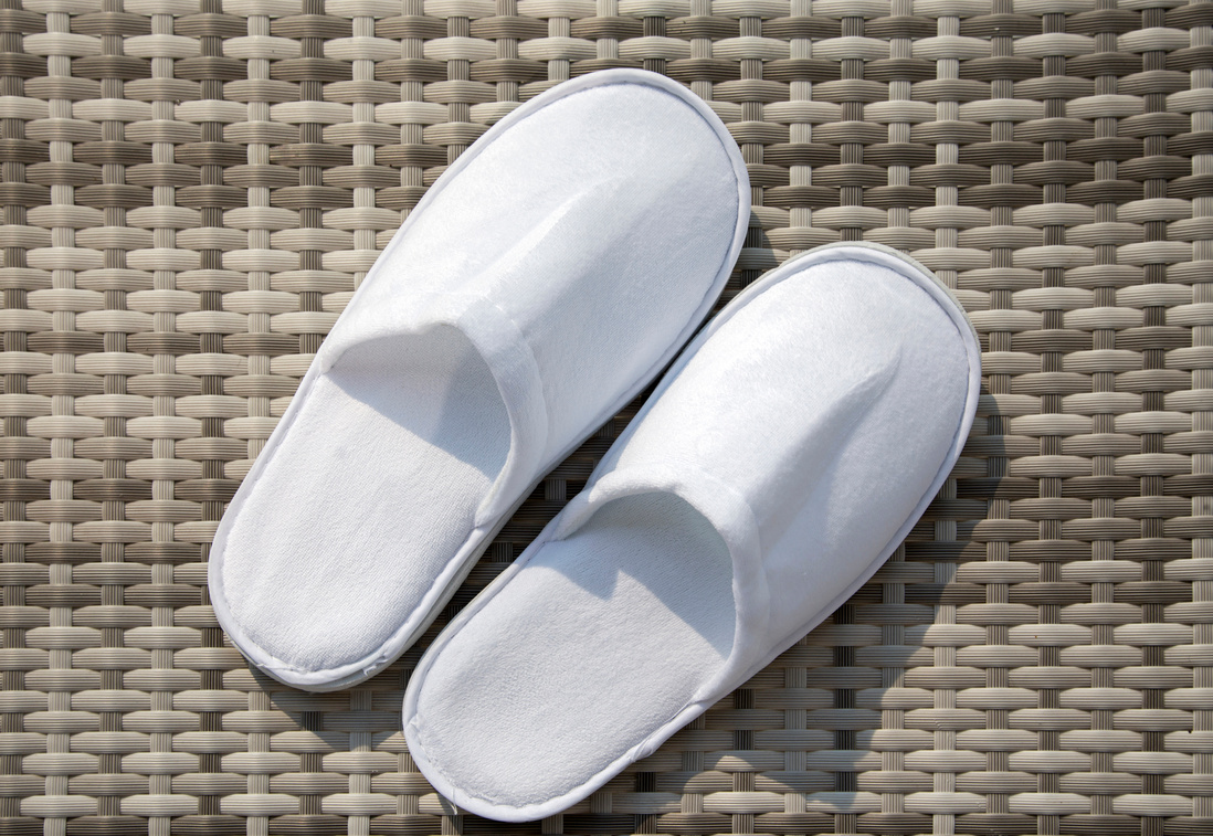 White disposable slippers for hotels